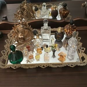 Home collection.Vntg perfume bottles,Collected for 40 years.mirrored bottom tray